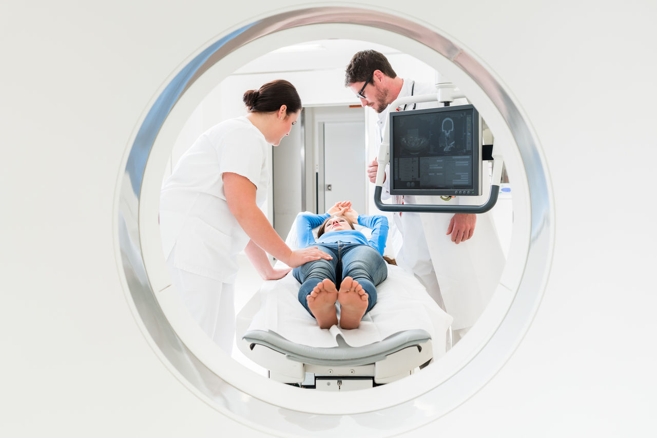 Doctor, nurse, and patient at CT scan