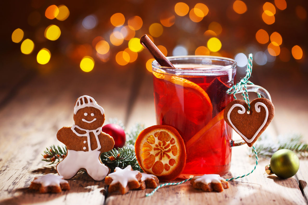 Christmas background with hot wine punch, cookies and smiling ginger bread man :),Christmas background with hot wine punch, cookies and smiling gi